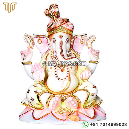 Ganesh Statue sitting on lots flower