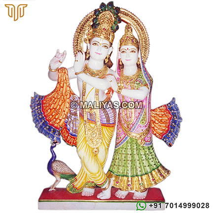 Lord Radha Krishna Murti with painting