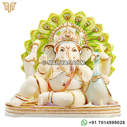 Marble Ganesh Statue sitting with peacock