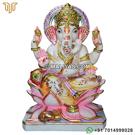 Marble Ganesh statue sitting on lotus