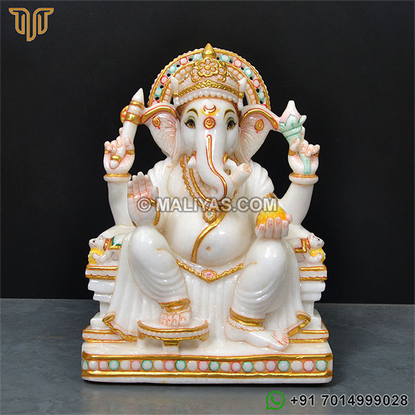 marble ganesh murti sitting on singhasan